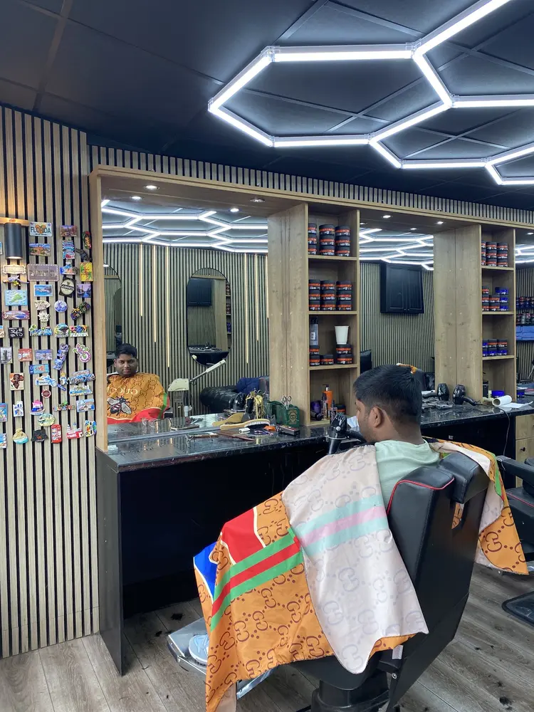 Barber chairs and magnet wall inside Antalya Barber